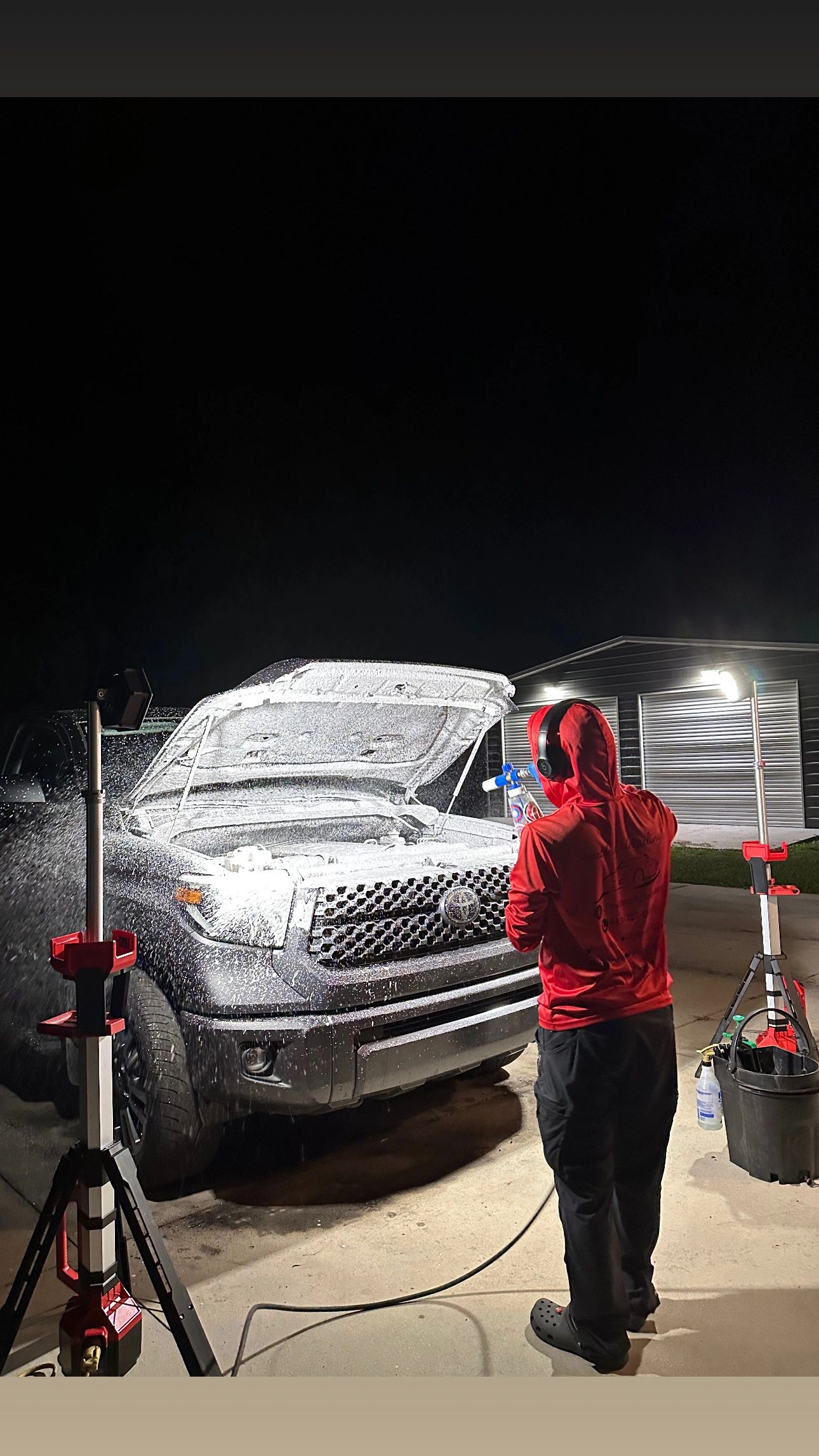 Professional car detailer at work